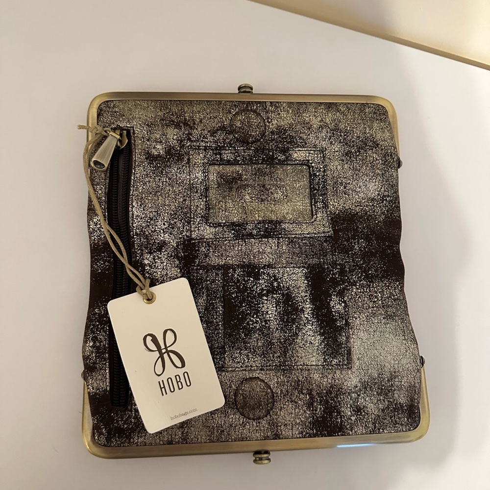 NWT. HOBO Black and Silver Textured Clutch